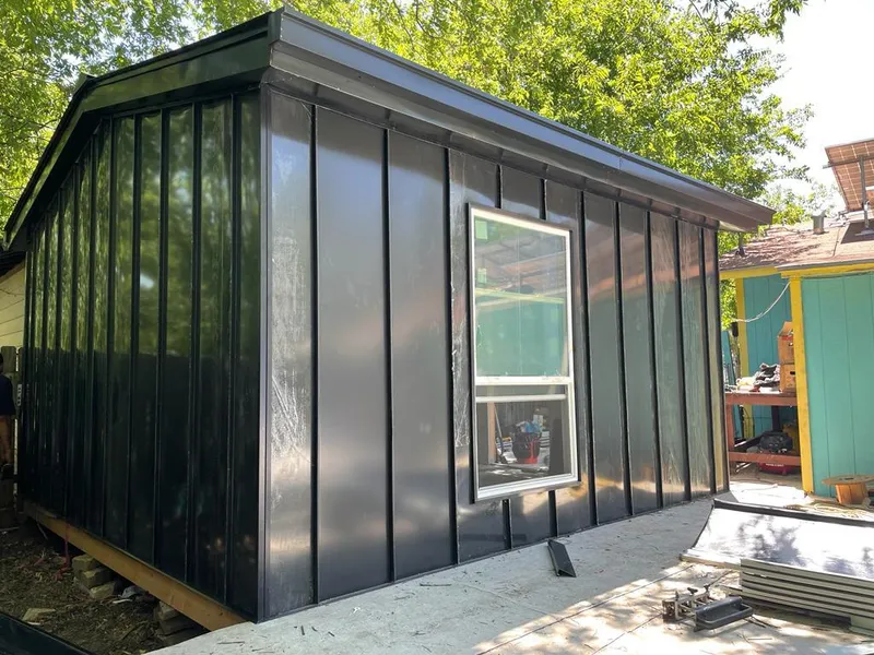 Black standing seam metal wall panels for Roof Inspection in West Brandywine