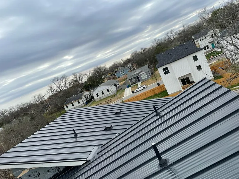 Standing seam metal roof panels with vents for Skylight Repair in West Brandywine